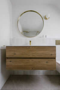 Meuble vasque et robinetterie laiton